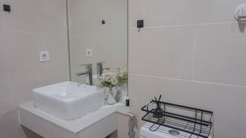 Studio | Bad | Dusj, håndklær, såpe og sjampo