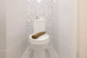 Studio | Bathroom | Shower, towels, soap, shampoo - Homey And Cozy Studio Apartment At Tokyo Riverside Pik 2 (Teluknaga)