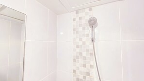 Studio | Bathroom | Shower, towels, soap, shampoo - Cozy Minimalist Studio Apartment Tokyo Riverside Pik 2 (Teluknaga)