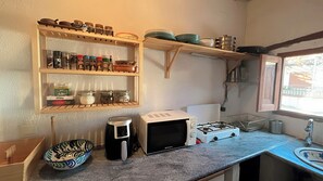 Microwave, coffee/tea maker, electric kettle, cookware/dishes/utensils