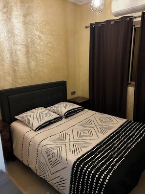 2 slaapkamers, een strijkplank/strijkijzer, wifi, beddengoed