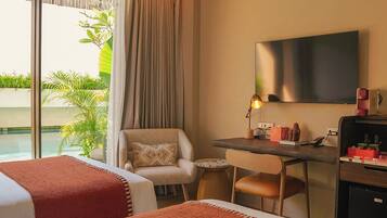 Estúdio superior, vista para a lagoa | Frigobar, cofres nos quartos, escrivaninha