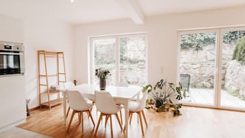Family Suite, Garden View | Living area | TV