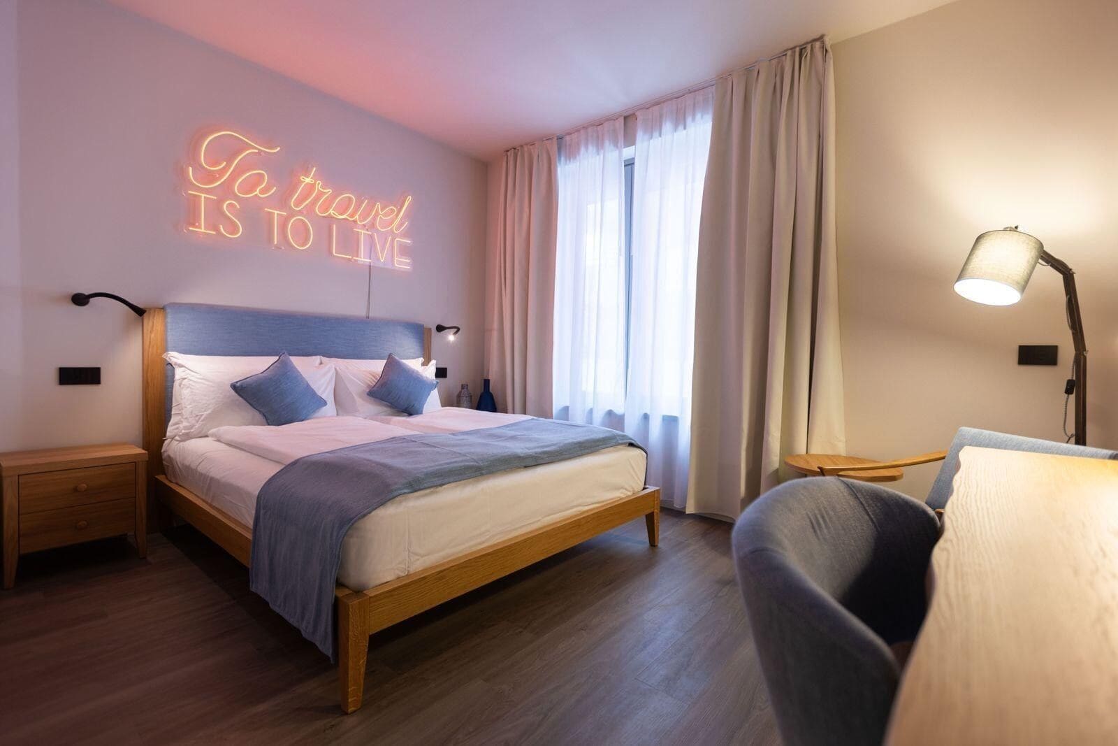 Standard Double Room | Minibar, in-room safe, desk, blackout drapes