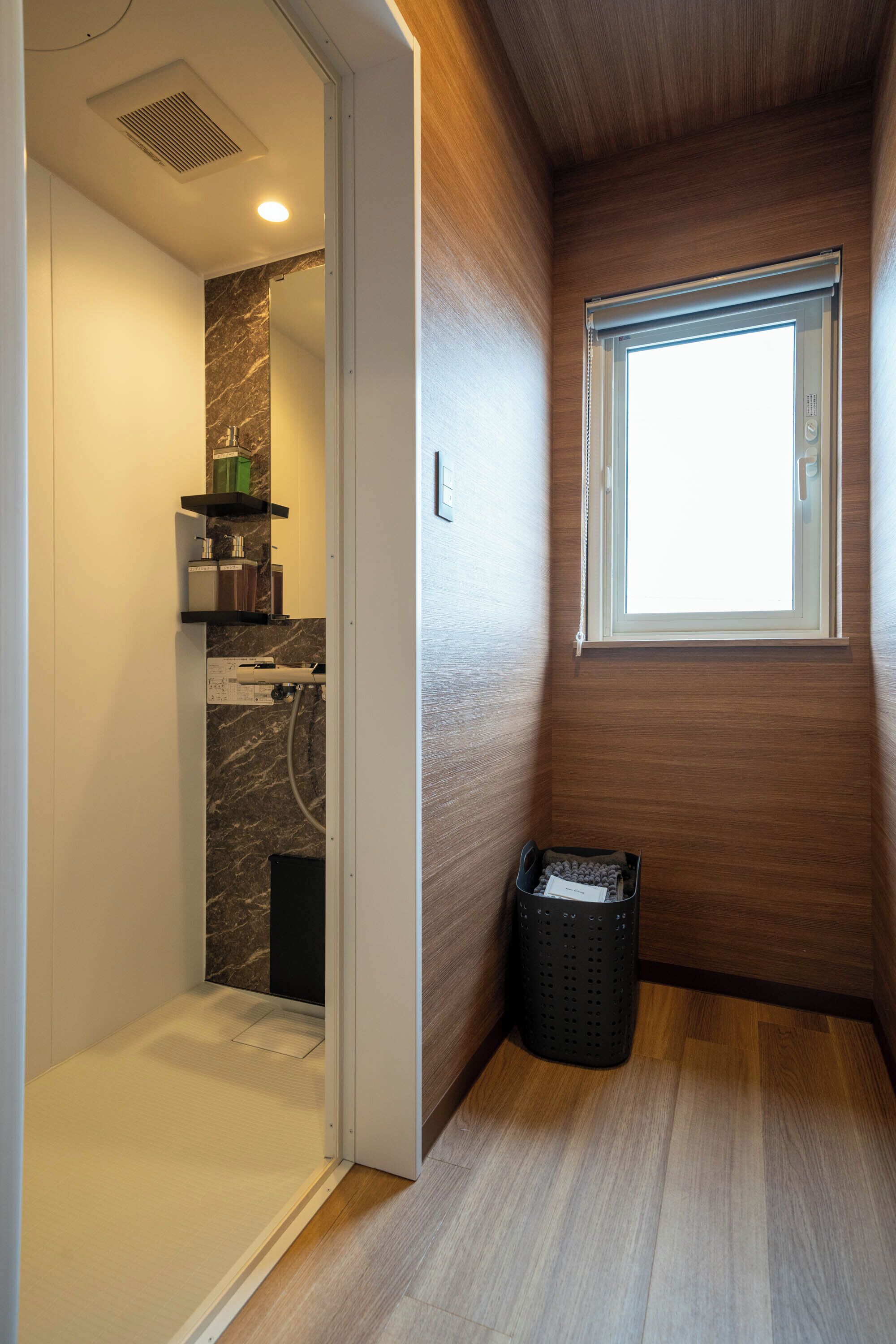 Hair dryer, slippers, bidet, towels