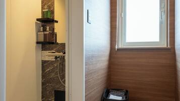 Hair dryer, slippers, bidet, towels