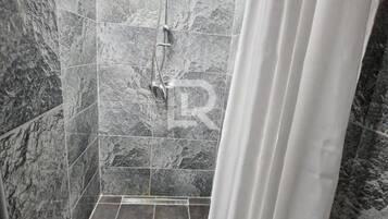Villa (Two Bedroom Villa with Balcony and Pa) | Bathroom | Shower, towels