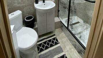 Hair dryer, towels, soap, toilet paper