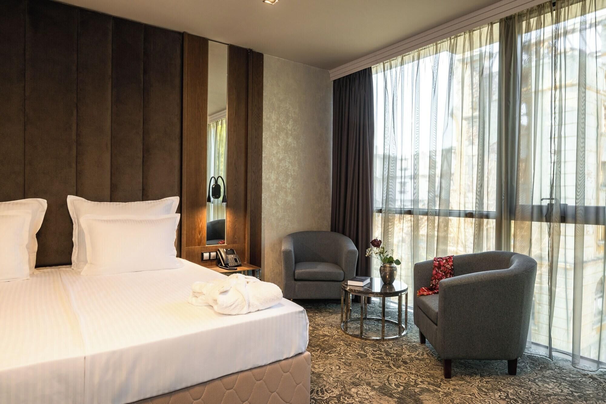 Premium bedding, memory-foam beds, minibar, in-room safe