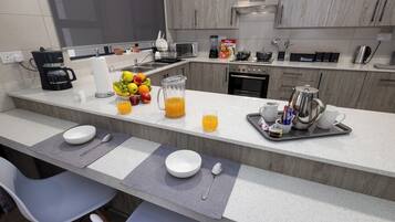 Mini-fridge, microwave, oven, stovetop