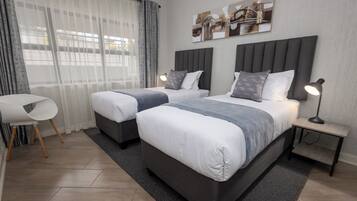 Appartement Deluxe, 1 chambre | 1 chambre, coffres-forts dans les chambres, fer et planche Ă repasser