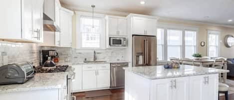 Dishwasher, coffee/tea maker, cookware/dishes/utensils