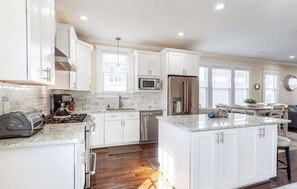 Dishwasher, coffee/tea maker, cookware/dishes/utensils