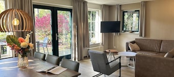 Comfortable bungalow with open kitchen, 3 bedrooms, 2 bathrooms, and optional sauna.