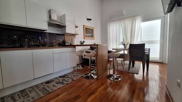 Apartment (One Bedroom Apartment with Sea View) | Private kitchen | Fridge