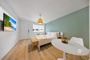 Iron/ironing board, travel crib, WiFi, bed sheets