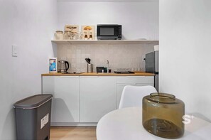 Fridge, microwave, coffee/tea maker, toaster