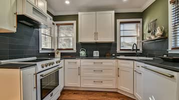 Dishwasher, toaster, blender, dining tables