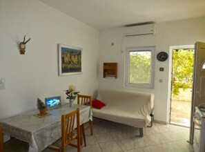 Apartment (Two Bedroom Apartment A4) | Living room | 32-inch flat-screen TV with satellite channels - Beachfront Apartments Plaža (Jelsa)