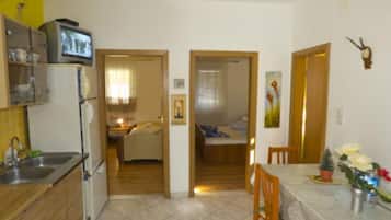 Apartment (Two Bedroom Apartment A4) | Private kitchen | Fridge