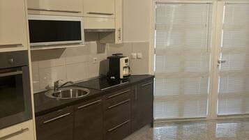 Apartment (One bedroom apartment 1) | Private kitchen | Fridge