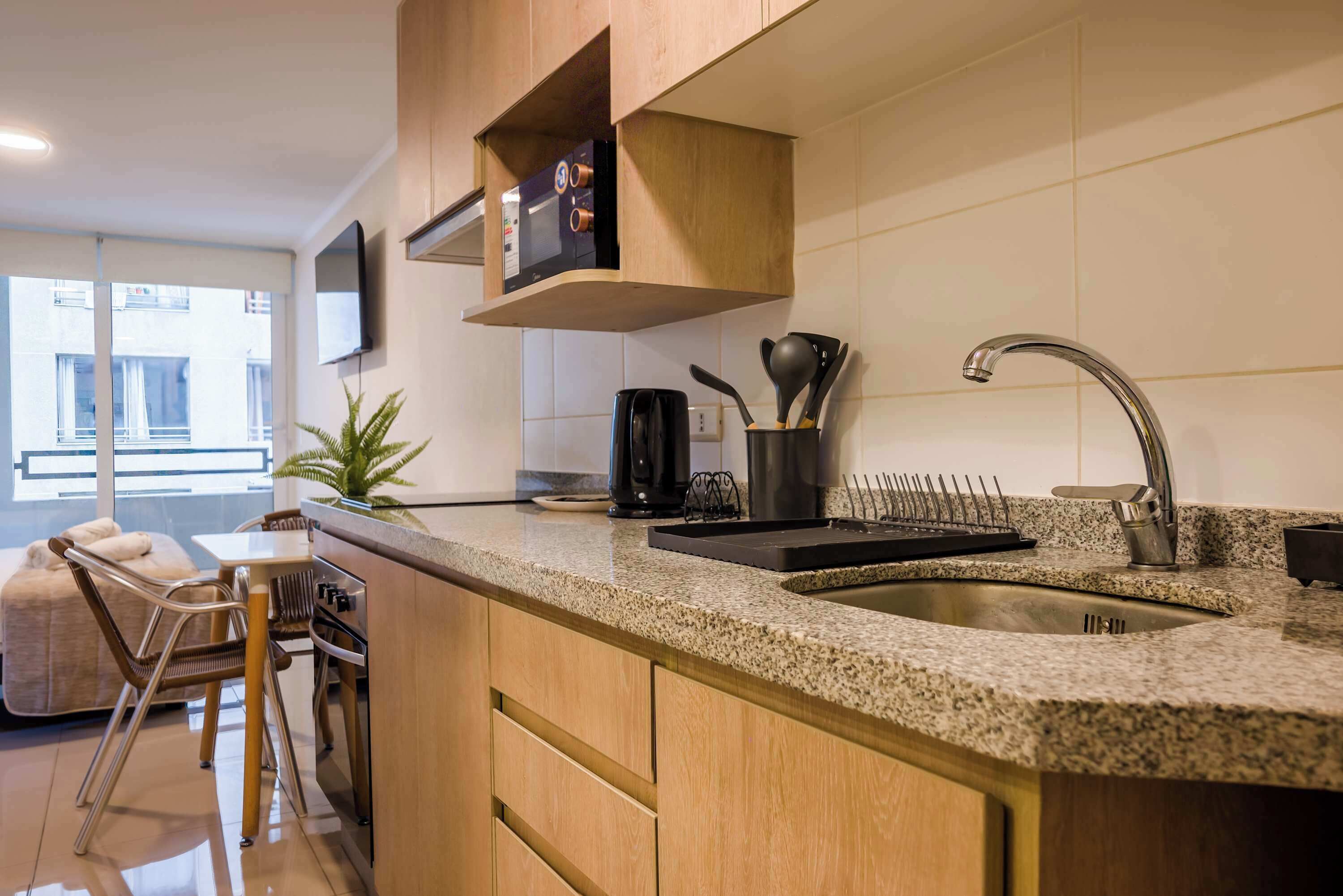 Coffee/tea maker, fridge, microwave, oven