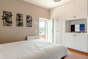 Neljän hengen luksushuone, 2 makuuhuonetta, näköala puutarhaan | Untuvapeitot, memory foam -patjalliset sängyt, yksilöllisesti sisustettu