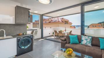 Luxury Penthouse | Living area | Flat-screen TV