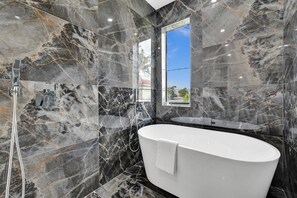 Shower, hair dryer, towels