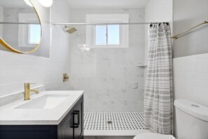 Shower, hair dryer, towels