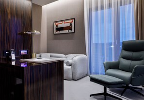 Grand Studio Suite | Living area | 100-cm Smart TV with digital channels