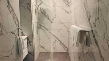 Deluxe Double Room | Bathroom | Shower, free toiletries, towels, soap