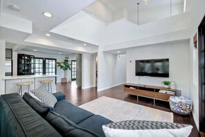 TV, fireplace, books, offices