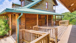 A log cabin with a porch and a covered deck. - Spacious Cabin w/ Views, Near Lake Lawtonka! (Medicine Park)