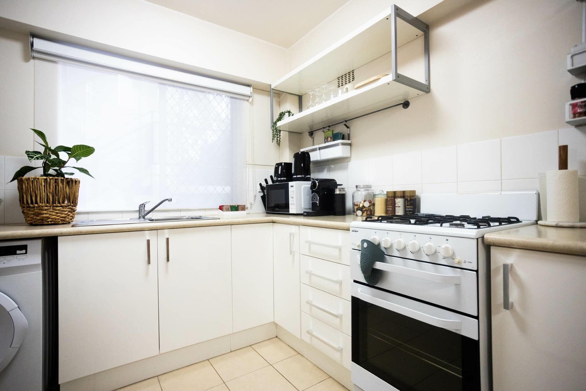 Coffee/tea maker, fridge, microwave, oven