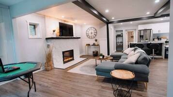 TV, fireplace, books, offices