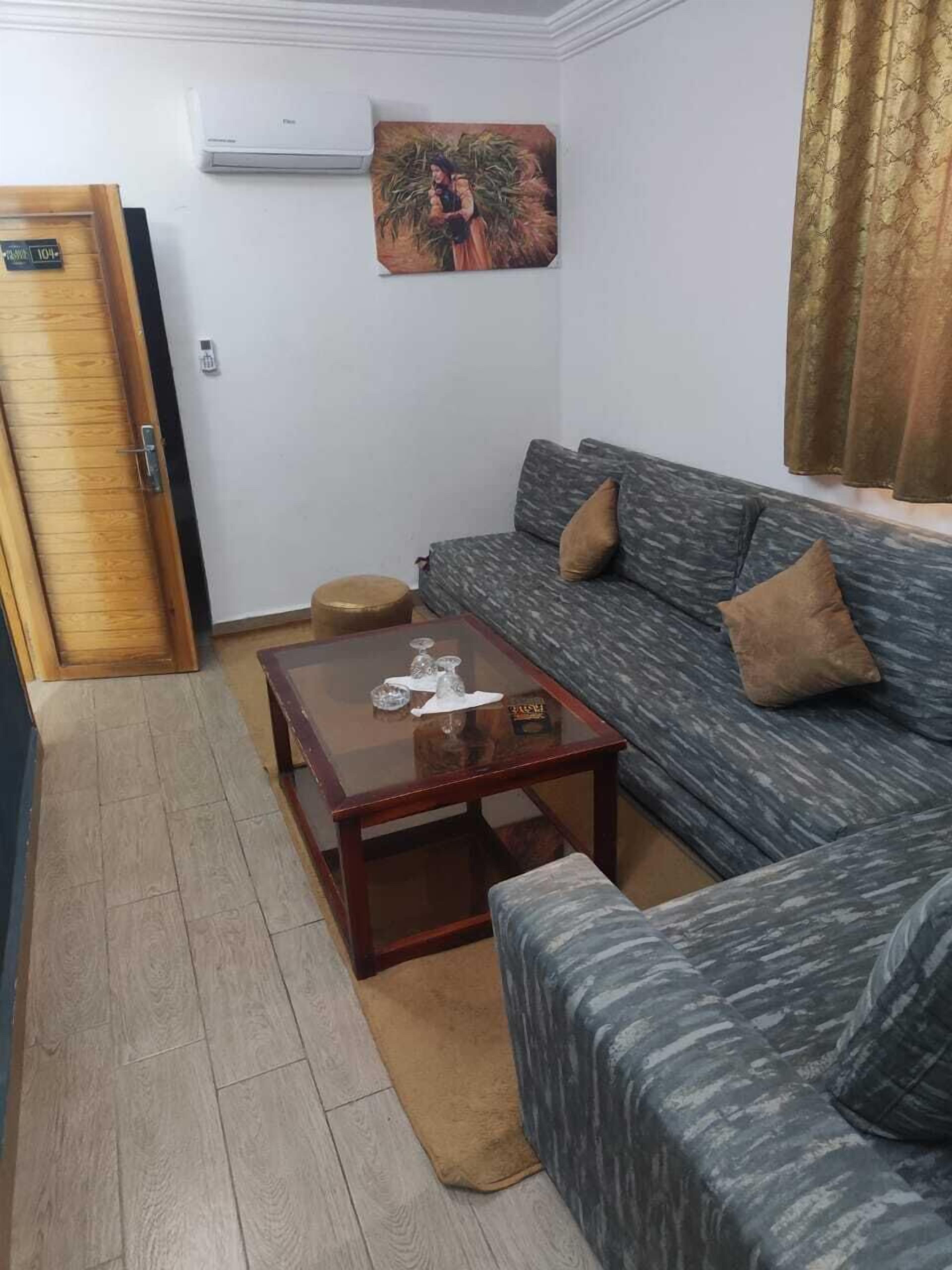 Family Suite | Living area | TV