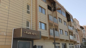 A multi-story hotel with a sign reading "PLAYA HOTEL". - HOTEL PLAYA DAKHLA (Dakhla)