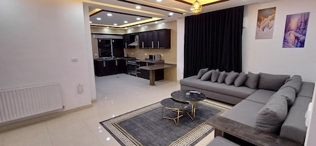 Flat-screen TV, fireplace. Laperla luxury apartments