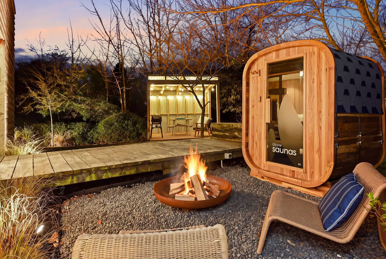 Light the fire in the fire pit while you wait for the sauna to heat up and then alternate between the sauna and the cold plunge bath.