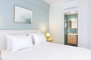 2 habitaciones, tabla de planchar con plancha, cuna de viaje y wifi 