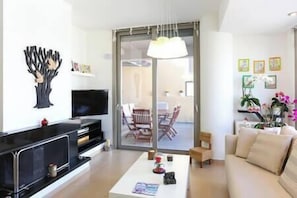 TV, fireplace - Armilides Luxury 3 bedroom maisonette apartment (Kokkini Hani)