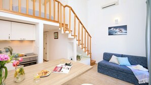 Apartment (0 Bedroom) | Living area | 82-cm LCD TV with satellite channels - Stone Whisper 1 (Dubrovnik)