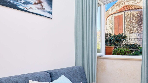 Apartment (0 Bedroom) | Living area | 82-cm LCD TV with satellite channels - Stone Whisper 1 (Dubrovnik)