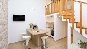 Apartment (0 Bedroom) | Living area | 82-cm LCD TV with satellite channels - Stone Whisper 1 (Dubrovnik)