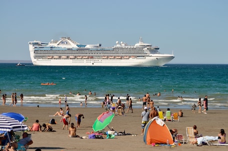 Beach nearby, white sand, beach bar. Ramada Residences by Wyndham Puerto Madryn CQ Parry