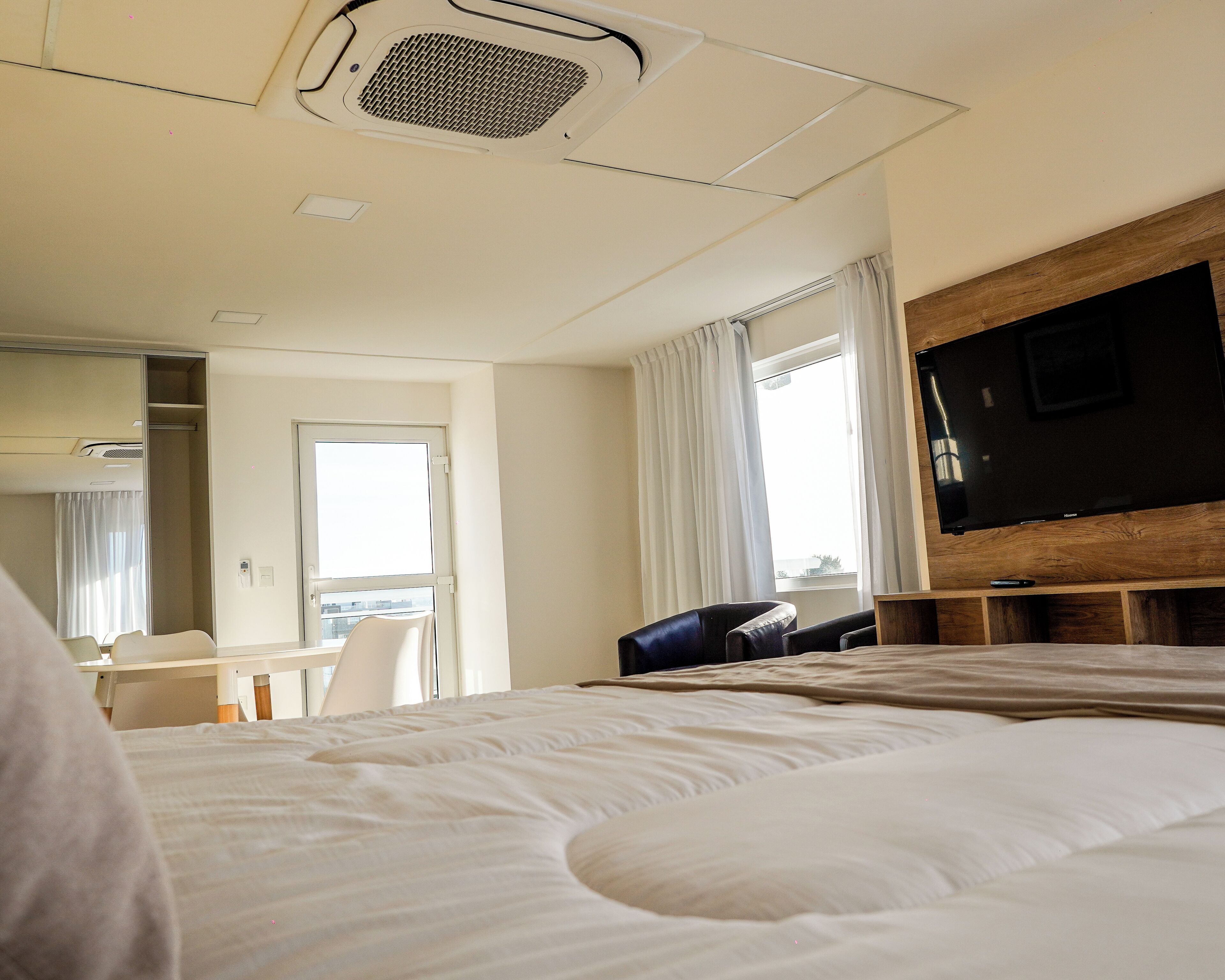 Premium bedding, down comforters, pillowtop beds, in-room safe