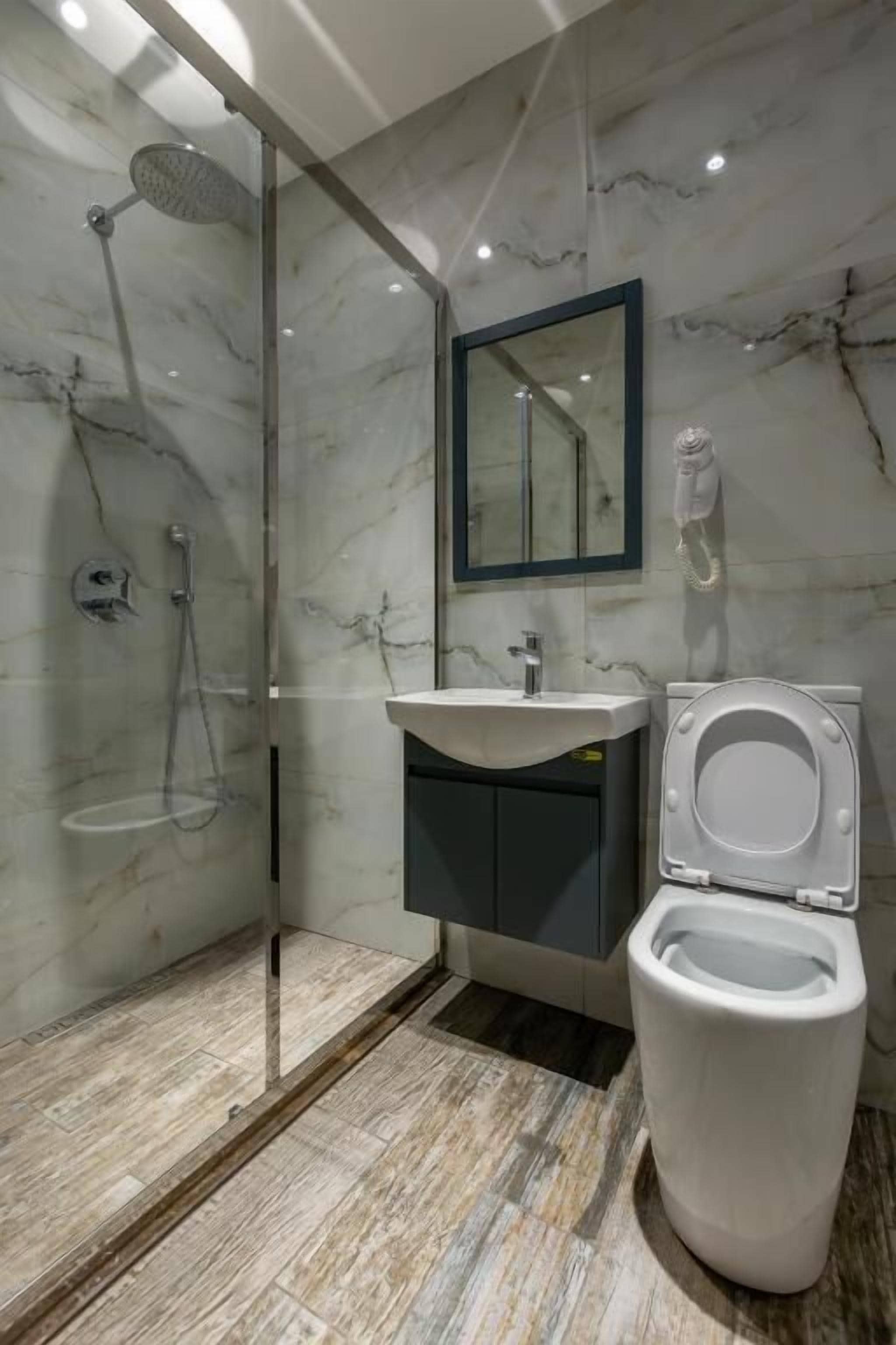 Shower, free toiletries, hair dryer, bathrobes
