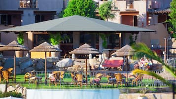 Seasonal outdoor pool, pool umbrellas, pool loungers