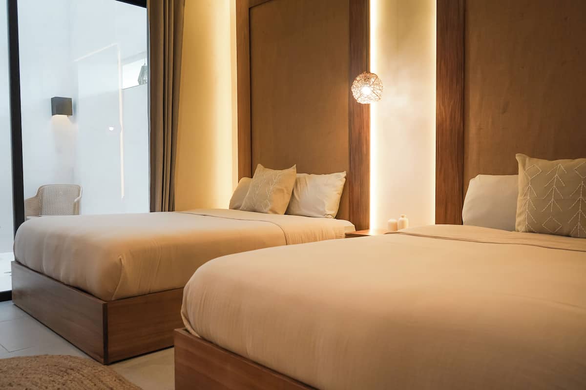 Departamento Deluxe, 2 habitaciones, alberca privada, vista a la alberca | 1 habitación, decoración personalizada, wifi gratis y ropa de cama